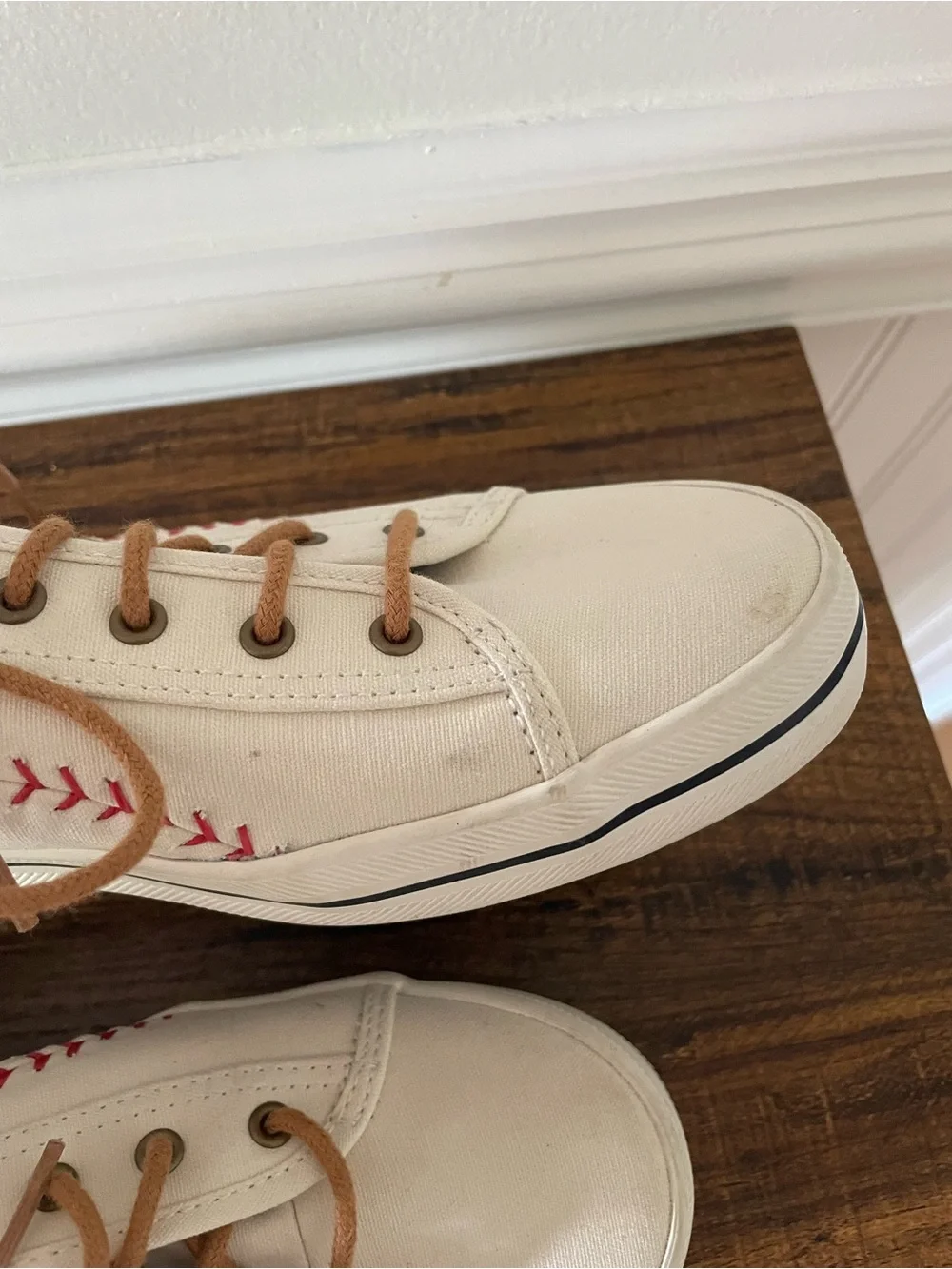 Keds White Canvas Sneakers with Red Stitching and Tan Laces